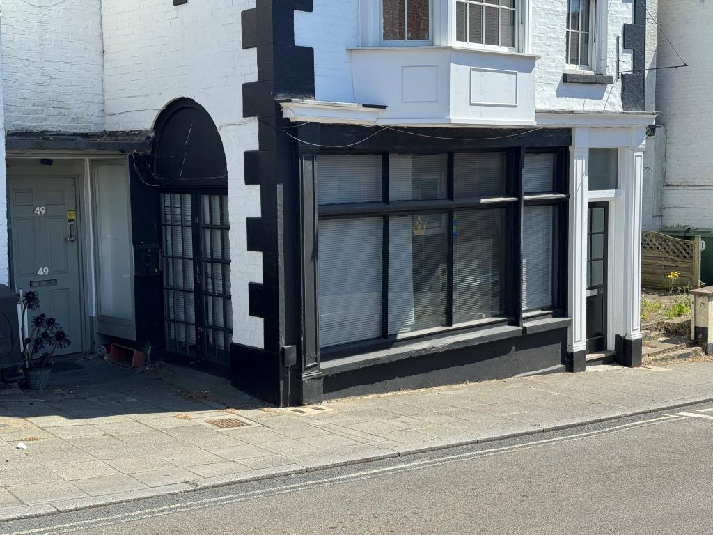 Lot: 54 - VILLAGE CENTRE COMMERCIAL PREMISES FOR INVESTMENT - Black painted window frames